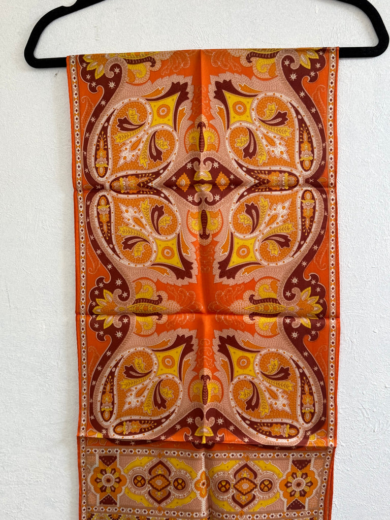 Vintage orange silk scarf with ornate brown gold and cream paisley floral print. 