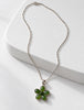 Sterling silver green jade five-petal flower pendant necklace displayed on white background