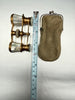 Antique Lemaire Paris opera glasses shown with measuring tape for size. 