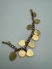 Back view of vintage Canadian provincial shield charm bracelet showing gold-tone metal