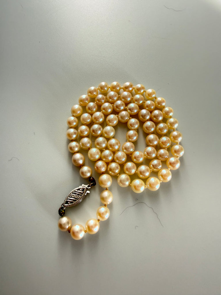 Vintage genuine freshwater pearl necklace with decorative 10K white gold clasp