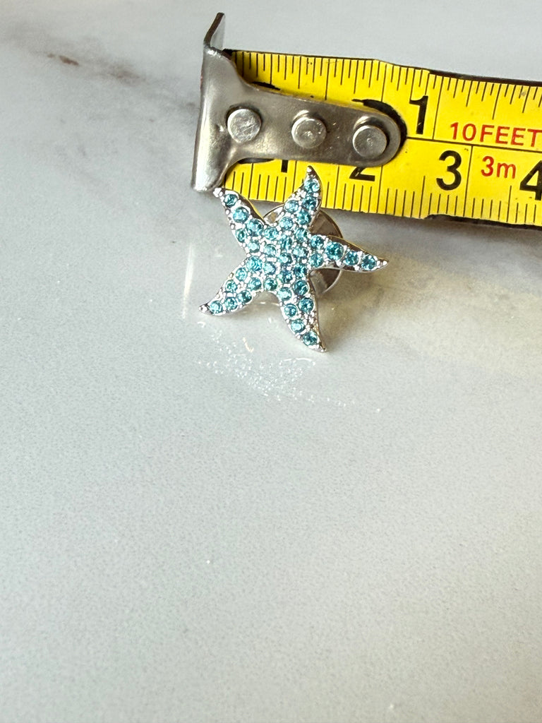Swarovski Eternity starfish pin measuring approximately 0.75 in