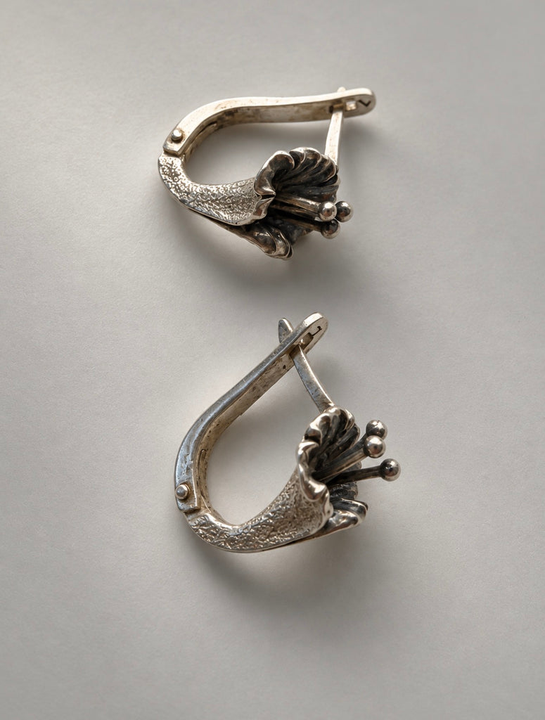 Side view of vintage Soviet floral earrings with English-lock backs