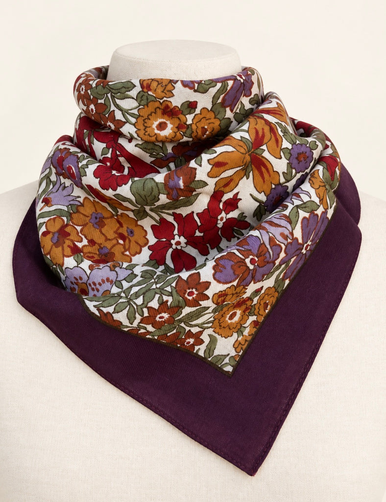 Liberty of London floral square scarf folded to show deep purple border