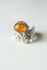 Side view of vintage Baltic amber sterling silver Brutalist ring showing sculptural silverwork