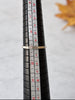 Vintage USSR amber ring displayed on sizing mandrel showing size 9