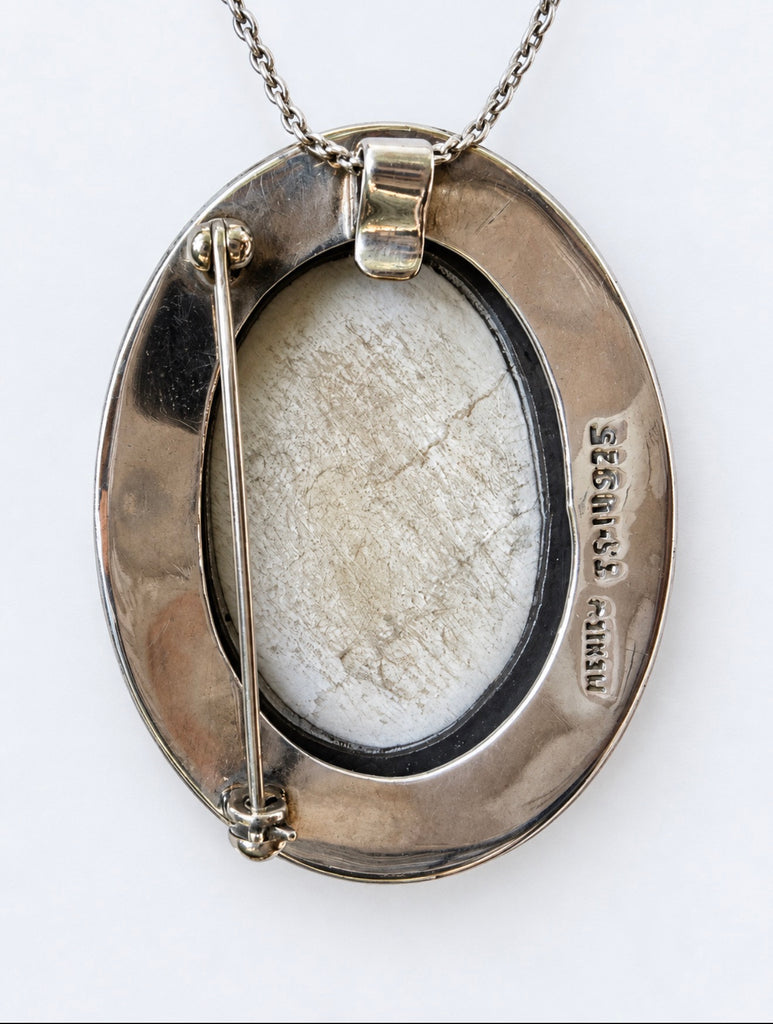 Reverse of vintage Mexican silver convertible brooch pendant showing pin and bail