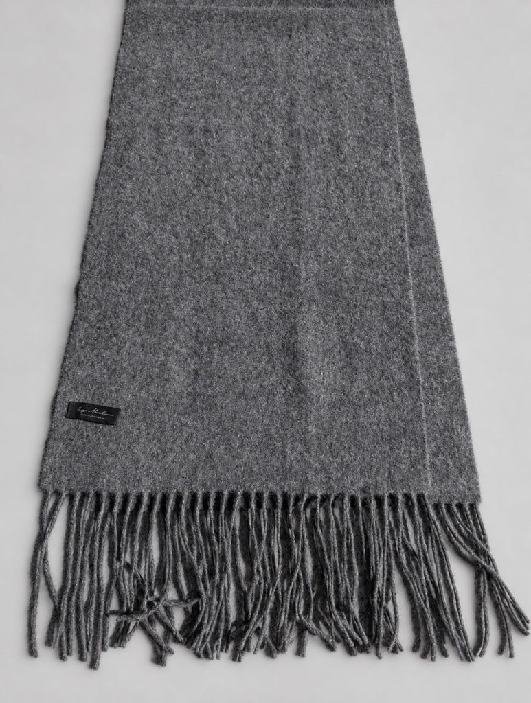 Detail of charcoal grey Enzo Mantovani cashmere scarf showing fabric texture and fringe