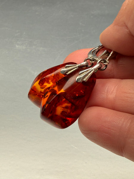 Vintage Baltic amber drop earring with cognac orange amber and decorative 835 silver lever-back fitting