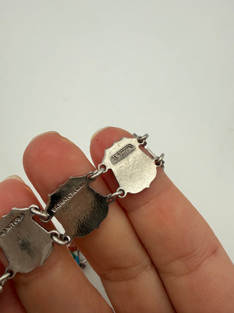 Back of vintage Canadian shield bracelet showing sterling silver and BMC markings