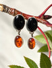 Vintage sterling silver dangle earrings with black onyx and natural cognac amber stones