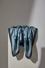 Blue and navy vintage silk scarf displayed showing flowing fabric and pattern