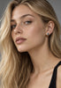 Small vintage geometric silver stud earrings shown worn on ear
