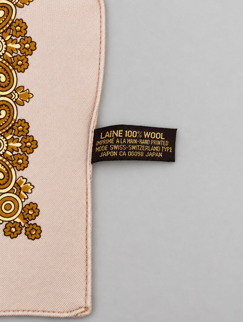 Vintage Swiss wool scarf showing original label and hand-printed fabric
