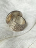 Back view of 925 sterling silver Nepal coin ring showing wide braided-style band