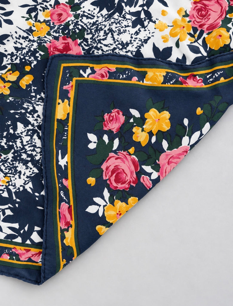 1980s silk square scarf showing pink rose yellow flower and green leaf pattern