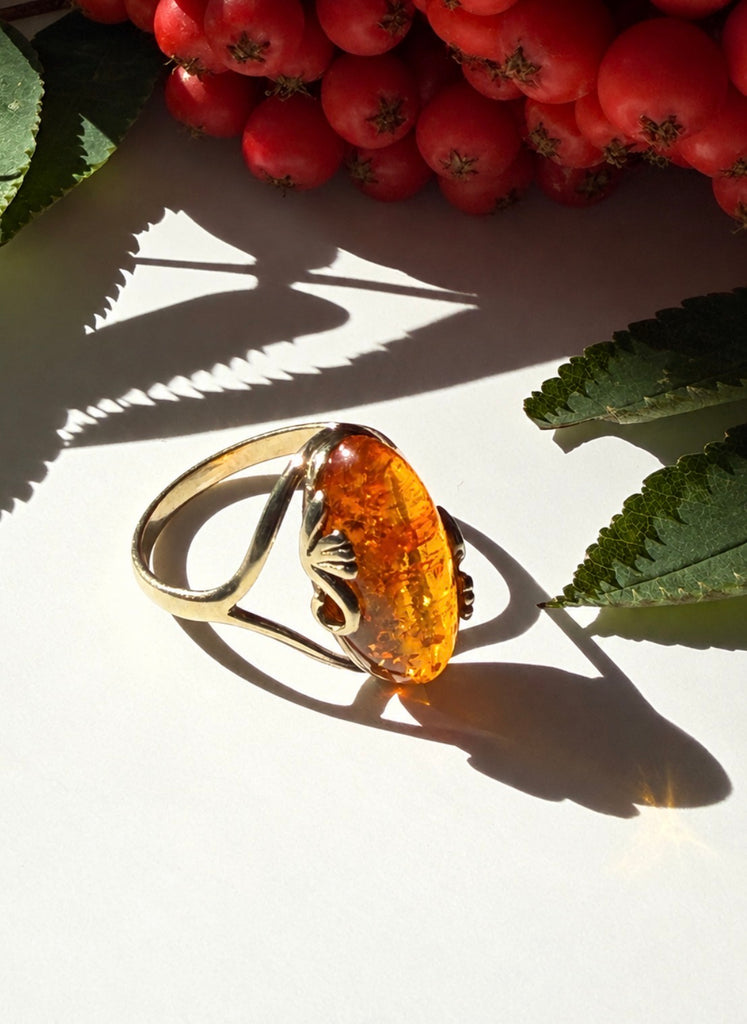 Vintage Polish Baltic amber ring in gold-plated sterling silver with cognac-orange amber cabochon among red berries