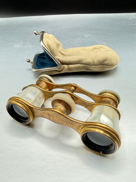 Antique Lemaire Paris mother-of-pearl and brass opera glasses displayed with their fitted vintage case. 