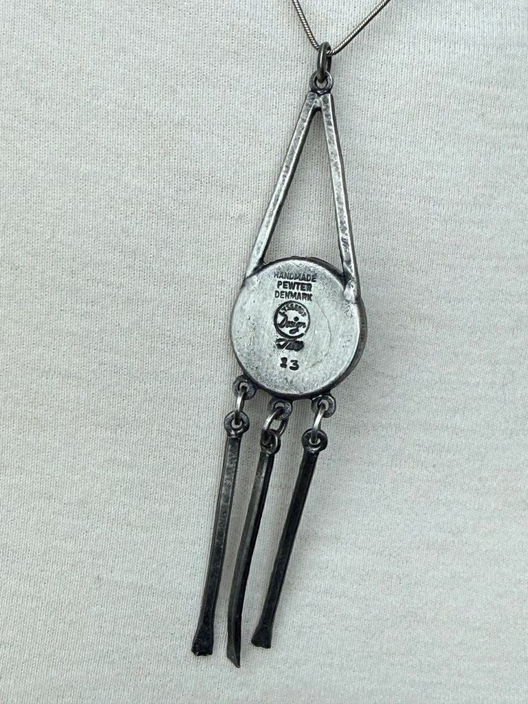 Back of vintage Lysgaard Design pewter pendant showing Handmade Pewter Denmark hallmark