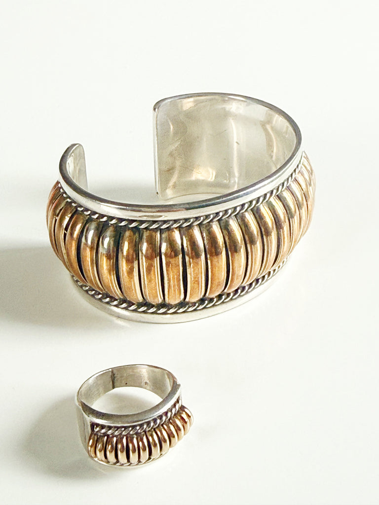 Matching Thomas Charley sterling silver cuff bracelet and ring displayed together