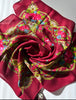 Vintage wool floral scarf tied to show colourful pink rose print