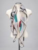 Aker Sport floral square scarf styled on mannequin showing lightweight drape