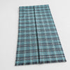 Vintage Valbisenzio Italian cashmere silk scarf in blue and teal plaid laid flat