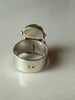 Back view of vintage sterling silver Baltic amber ring showing wide band construction