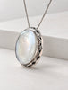 Mexican 925 silver pendant displayed hanging from sterling silver chain