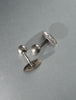 Vintage sterling silver cufflinks showing fixed ball-back closures