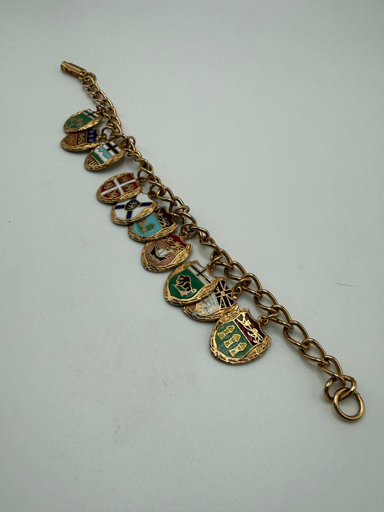 Full view of vintage gold-tone Canadian provincial enamel charm bracelet