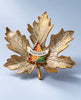 Vintage Montreal souvenir brooch with textured gold-tone maple leaves and colourful enamel