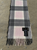 Barbour winter scarf showing fringed ends and traditional checked pattern