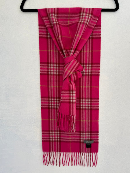 Neiman Marcus fuchsia pink plaid cashmere scarf with fringed ends hanging vertically