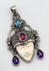 Vintage Balinese goddess 925 sterling silver pendant with carved cream face and blue pink and purple gemstone accents