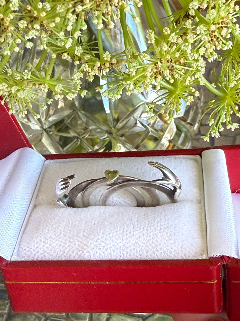 Sterling silver Fede Gimmel ring photographed inside red gift box