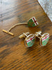 Matching Ontario coat of arms cufflinks and tie tack arranged together