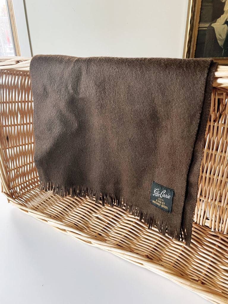 Vintage Glen Currie brown wool scarf showing solid design and fringed ends. 
